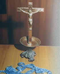 CROSS AND TASSLE